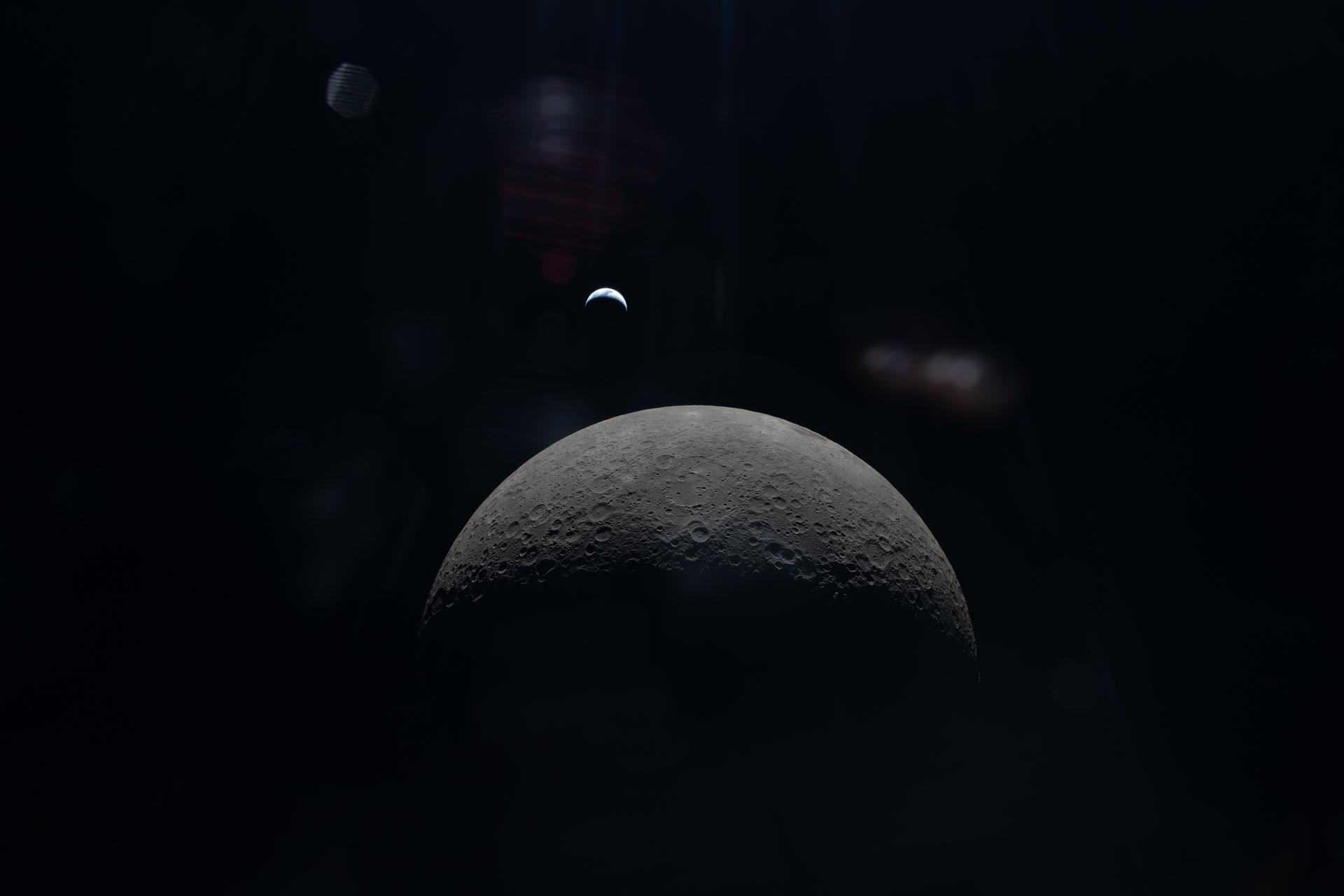 Crescent Earth Over Lunar Horizon - NASA